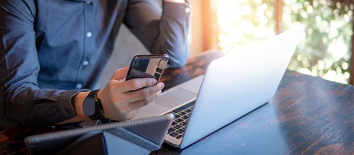 Image of a Broker communicating with his clients via phone